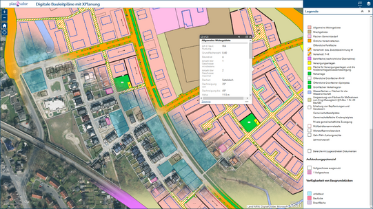 Vogelperspektive auf eine digitale Landkarte mit farbigen Planflächen